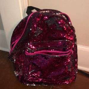 Pink Sparkly book bag.